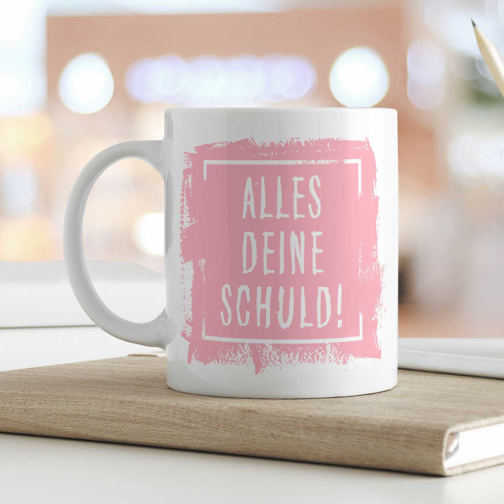 Bedruckte Tasse mit Spruch Alles Deine Schuld!